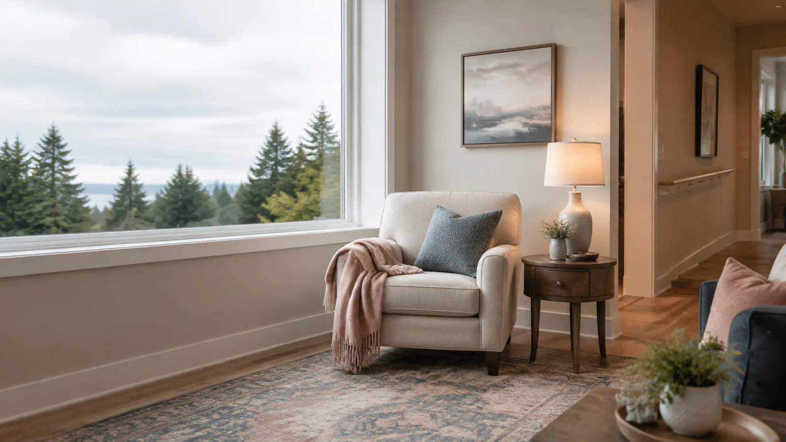 Warm accessible living room with a clear walking path and a supportive hallway rail